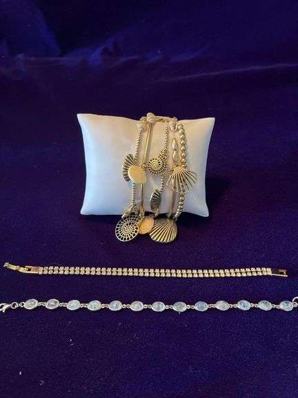 Gold Tone Liz Claiborne Stack Shell Bracelets, Rhinestone Tennis Bracelet and Silver Moonstone Bracelet image
