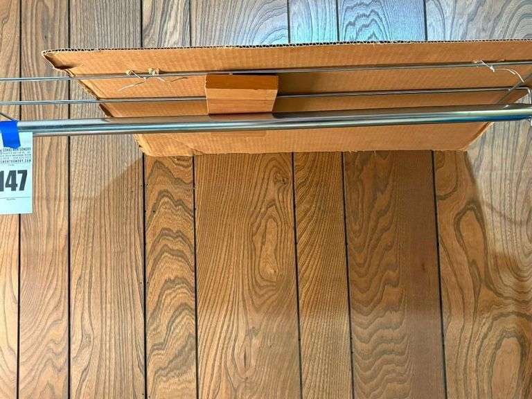 Rolling Chrome Garment Rack with Shelf
