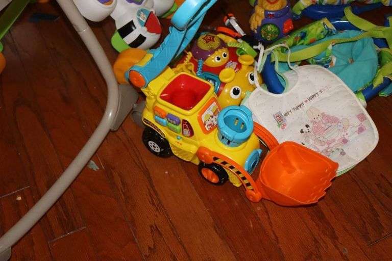 Variety of Kid Items: High Chair (needs a good cleaning), Seat, Toys, Jumpy Swing, Books, Etc.