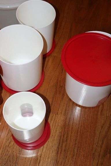 Variety of Tupperware and additional plastic storage items: cake keeper, pitcher, containers, canisters bowls etc.