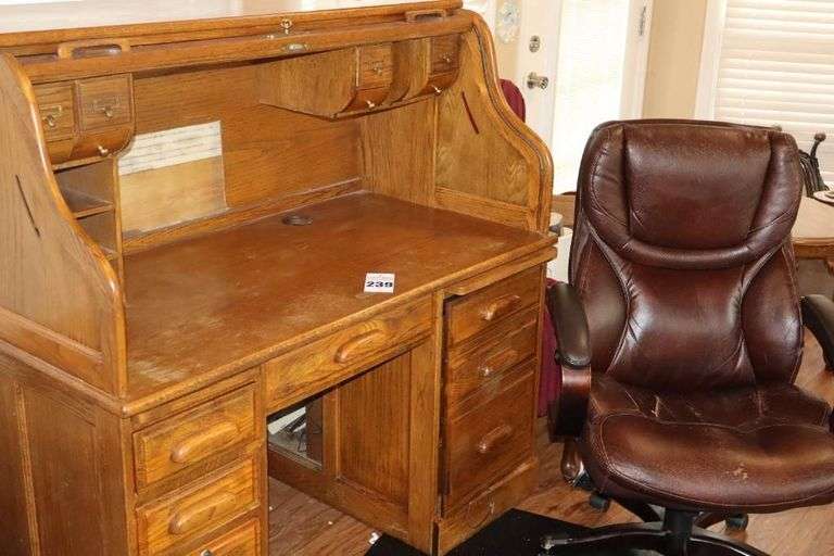 Wood Roll Top Desk (53"x53"x30") with Cubbies & drawers, drawers, slid out key board drawer, side door with drawers inside, Desk Chair (42"x27"x21") & Plastic floor protector Mat