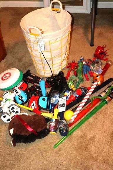 Tall Metal Basket with cloth Liner with a Variety of Play Characters, Dinosaurs, Remote Items (no Batteries), Swards, Etc. image