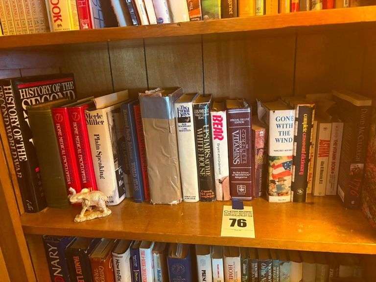 Shelf of Assorted Hardcover Books