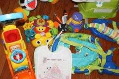 Variety of Kid Items: High Chair (needs a good cleaning), Seat, Toys, Jumpy Swing, Books, Etc.