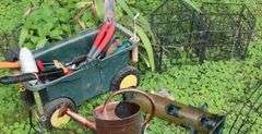 Variety Gardening Items: Planters, Bird Feelers, Rolling Cart with a varity of garden tools