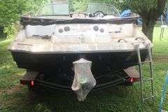 2007 Tahoe 216 Ski Boat on Tahoe Heavy Duty Trail and MerCruser Motor (Has been Winterized) with Boat Cover and Some additional Items