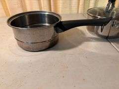 Set of Three Stainless Steel Saucepans