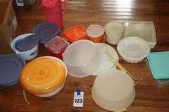 Variety of Tupperware and additional plastic storage items: cake keeper, pitcher, containers, canisters bowls etc.