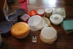 Variety of Tupperware and additional plastic storage items: cake keeper, pitcher, containers, canisters bowls etc.