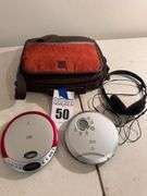 Two Portable CD Players with Radio and Accessories