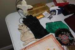 Variety of Items: Ladies Evening Bags, Gloves, Wallets, Defuzzers, Handkerchiefs, Variety of Glasses, Lipstick Holders etc.