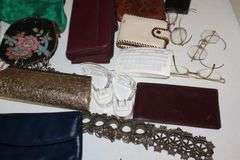Variety of Items: Ladies Evening Bags, Gloves, Wallets, Defuzzers, Handkerchiefs, Variety of Glasses, Lipstick Holders etc.