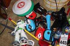 Tall Metal Basket with cloth Liner with a Variety of Play Characters, Dinosaurs, Remote Items (no Batteries), Swards, Etc.