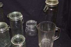 Variety of Glass Jars (one set) wire bale tops & glass pitcher