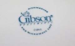 Gibson Dishware & a few similar Newcor White dishes: 3 dinner plates, platter, 4 bowls, 3 pate, 6 mugs, butter dish, gravy bowl with plate, creamer etc.