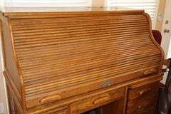 Wood Roll Top Desk (53"x53"x30") with Cubbies & drawers, drawers, slid out key board drawer, side door with drawers inside, Desk Chair (42"x27"x21") & Plastic floor protector Mat