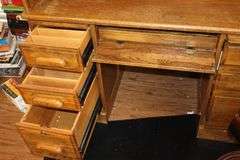 Wood Roll Top Desk (53"x53"x30") with Cubbies & drawers, drawers, slid out key board drawer, side door with drawers inside, Desk Chair (42"x27"x21") & Plastic floor protector Mat