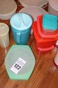 Variety of Tupperware and additional plastic storage items: cake keeper, pitcher, containers, canisters bowls etc.