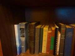 Collection of Books on Shelves