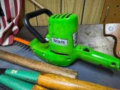 Assorted Tools Including Sears Hedge Trimmer, Hand Saw, Hammer, Level, and Shears