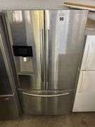 Samsung French Door Refrigerator Model RF263BEAESR