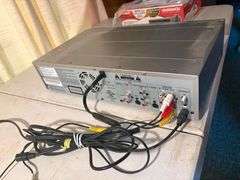 Magnavox Video Cassette Recorder/DVD Recorder Model No. MWR20V6 with TB110MW9 DTV Digital to Analog Converter and Remote