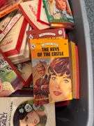 Box of Harlequin Romance Novels