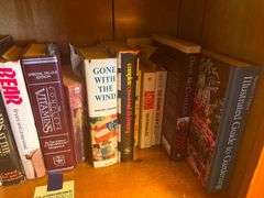 Shelf of Assorted Hardcover Books