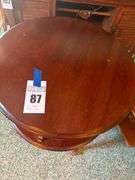 Round Cherry Wood Accent Table with Display Shelf