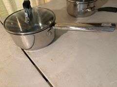 Set of Three Stainless Steel Saucepans
