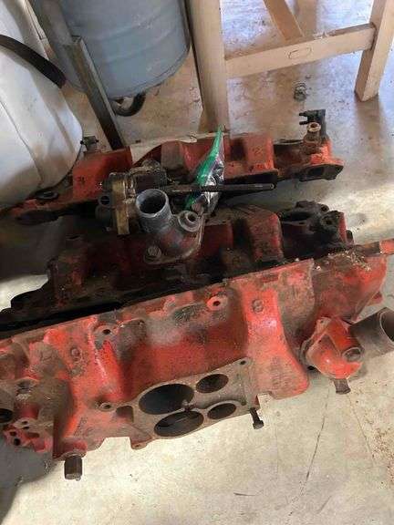 GM Chevrolet Cast Iron Intake Manifold, Likely from a 1968 model year,)