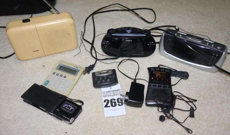 Variety of items: Alarm Radios, Mini Tape Recorder, Walkman etc. image