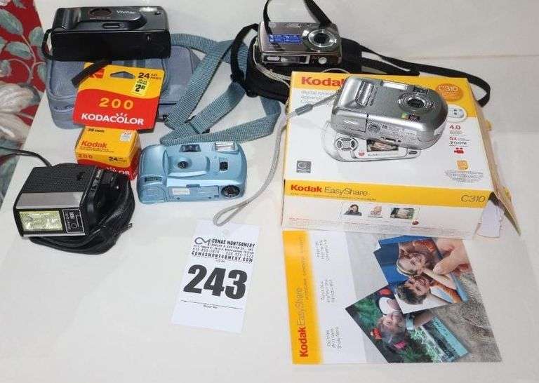 Variety of Cameras  Additional Items: Kodak Easy Share Digital Camera, HP Digital, Vivitar Auto Flash, Vivitar 35 MM Camera , & Roll of film image