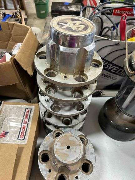 6- 4x4 Center Wheel Caps and 7 Chevy Center Wheel Caps