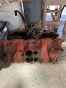 GM Chevrolet Cast Iron Intake Manifold, Likely from a 1968 model year,)