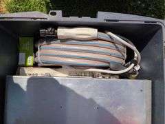 2 Totes - 2 Life Vests,Hose and Misc Camping Equipment
