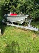 14’ Cherokee Fishing Boat with a Johnson 25 Motor