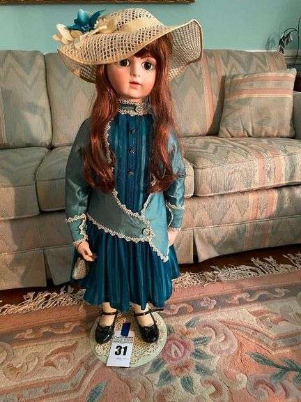 Collectible Porcelain Doll with Hat and Outfit image