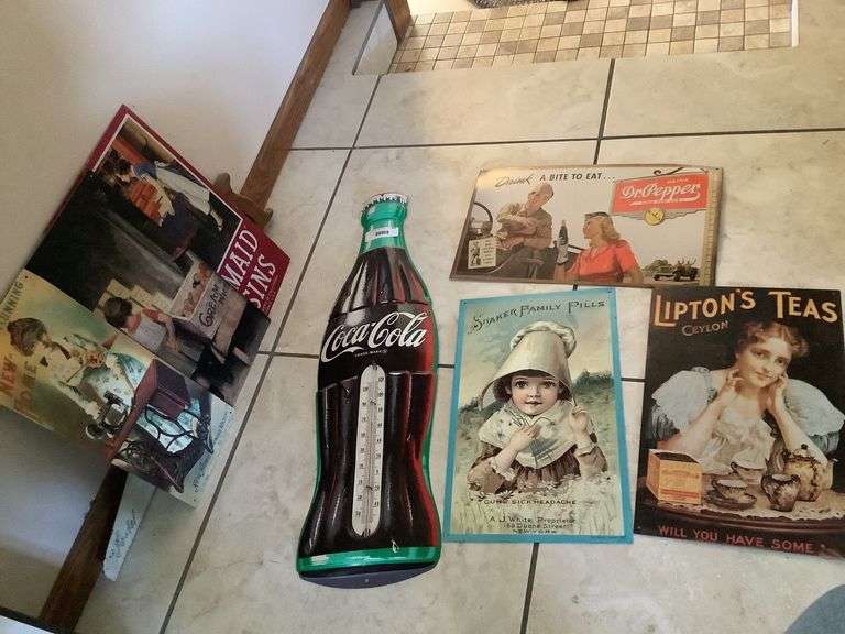 Lipton's Tea Sign; Shaker Family Pills Sign; Dr. Pepper Sign; Coca-Cola Thermometer; The Light-Running New-Home Sign; Cream of Wheat Sign; Sun-Maid Raisins Sign; Hand Painted Saw image