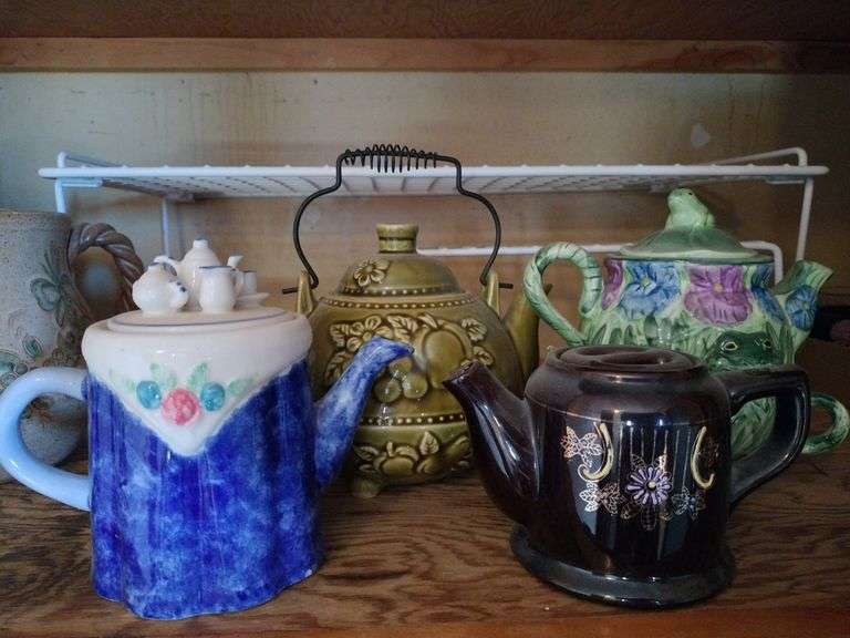 Vintage Petty Teapot With Mini Tea set On Lid; Made in Japan Teapot For One Haindpainted Vintage Collectible; Silvestri Tea For One 1998 Stacking Teapot Lid and Cup 3 Pc Frogs & Flowers Cute; Vintage 1960s Japan Olive Green Embossed Fruit Footed Teapot with Wire Handle image