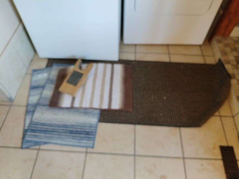 Wooden Boot Jack and Throw Rugs image