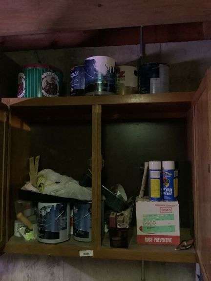 Shelf of Assorted Paints, Supplies, and Storage Containers image