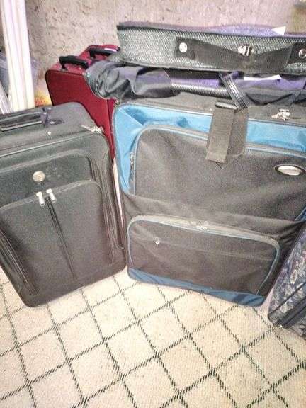 Assorted Suitcases and Violin Case image