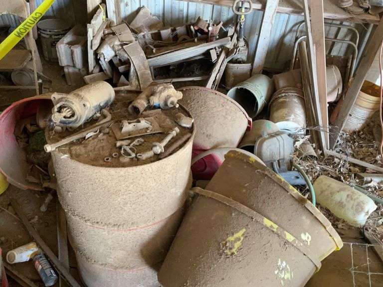 Assorted Buckets, Barrels, and Mixed Metal Scrap image