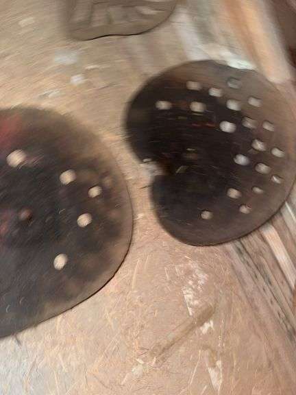 Two Metal Tractor Seats image