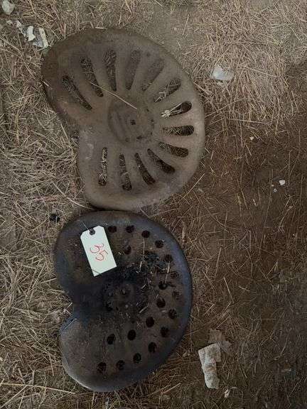 Two Vintage Tractor Seats image