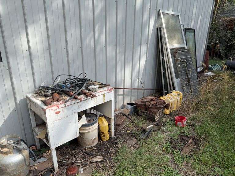 Assorted Collection of Metal Components, Tractor Weights, Door, Tool Rack, and Other Items image