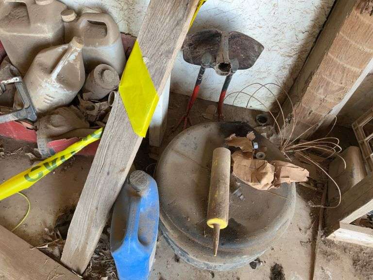 Various Garage and Farm Items Including Power Tools, Metal Barrel, and Assorted Containers image