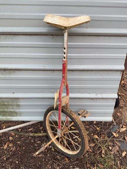 Well-Loved Red Unicycle image