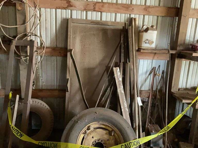 Lot of Mixed Metal and Lumber Pieces with Tractor Tire image